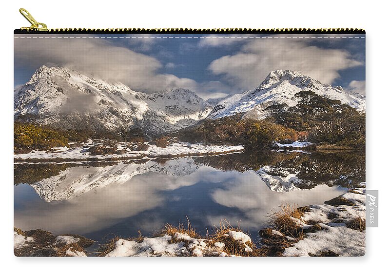 00446716 Zip Pouch featuring the photograph Winter Dawn Reflection Of Mount by Colin Monteath