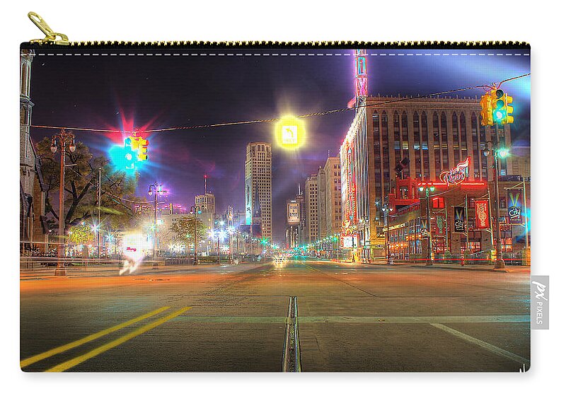 King Kong Zip Pouch featuring the photograph Woodward Ave Detroit MI by Nicholas Grunas