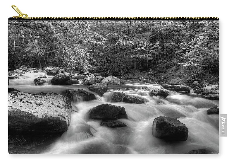 Monochrome River Scene Zip Pouch featuring the photograph A Black And White River by Mike Eingle