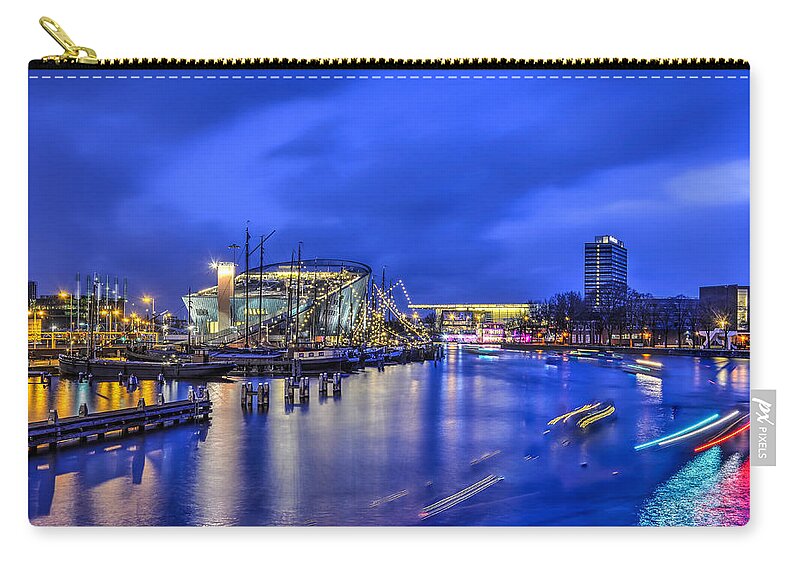 Blue Zip Pouch featuring the photograph Nemo in the Blue Hour by Frans Blok