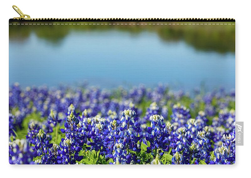 Austin Zip Pouch featuring the photograph Bluebonnets #1 by Raul Rodriguez