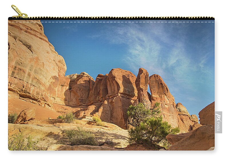 Canyonlands National Park Zip Pouch featuring the photograph Chesler sunset #1 by Kunal Mehra