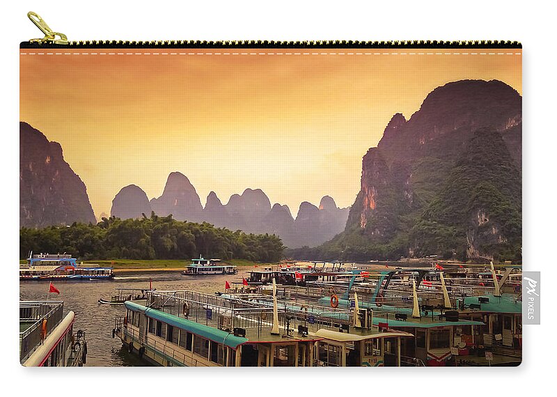 Sunset Zip Pouch featuring the photograph Boat watching the sun goes down-China Guilin scenery-Lijiang River in Yangshuo by Artto Pan