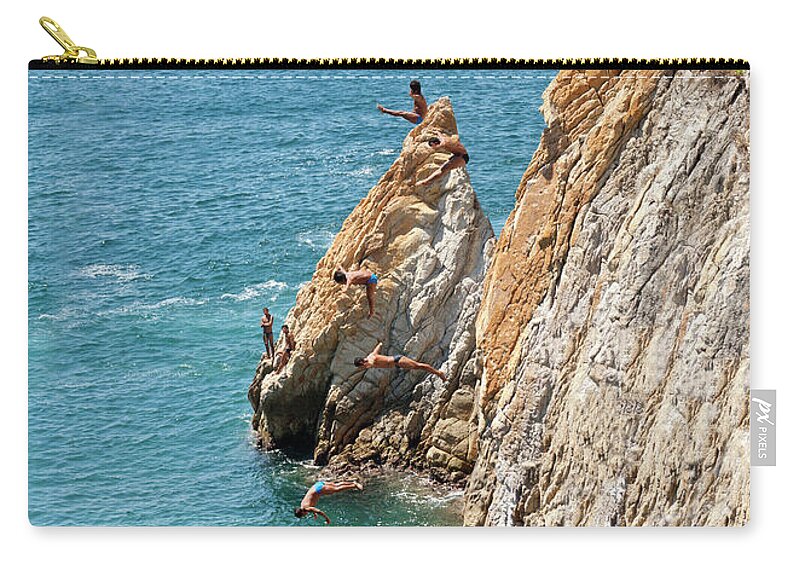 Cliff Divers Zip Pouch featuring the photograph Famous cliff diver of Acapulco Mexico #1 by Anthony Totah