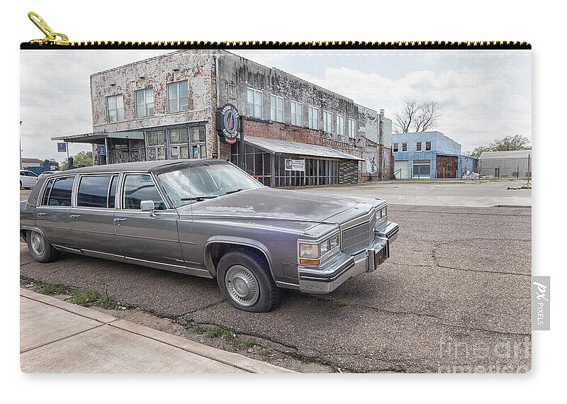 America Zip Pouch featuring the photograph Limousine in front of Ground Zero Blues Club in Clarksdale, birthplace of the Blues by Patricia Hofmeester