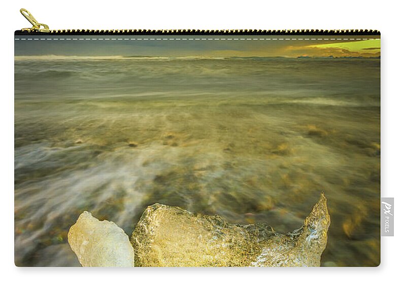 Iceland Zip Pouch featuring the photograph Ice in Surf at Dusk. #1 by Andy Astbury