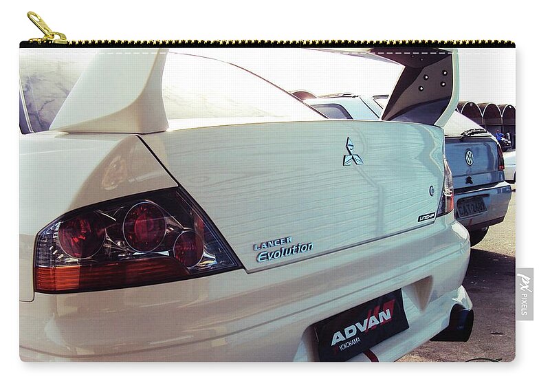 Mitsubishi Evolution Zip Pouch featuring the photograph Mitsubishi Evolution #1 by Jackie Russo