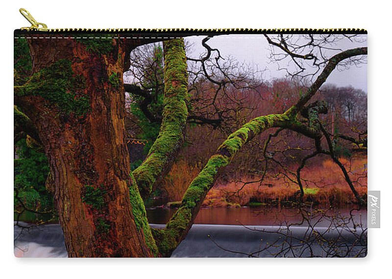 Europe Zip Pouch featuring the photograph Mossy Tree Leaning Over The Smooth River Wharfe #1 by Dennis Dame