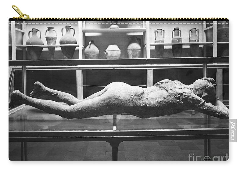 1873 Zip Pouch featuring the photograph Pompeii: Plaster Cast #1 by Granger