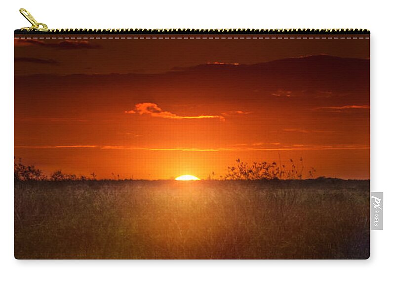Sunset Zip Pouch featuring the photograph Sawgrass Sunset #1 by Mark Andrew Thomas