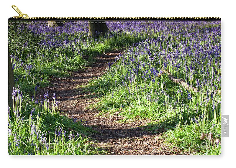 Norfolk Zip Pouch featuring the photograph Norfolk, England sunrise path through bluebell woods by Simon Bratt