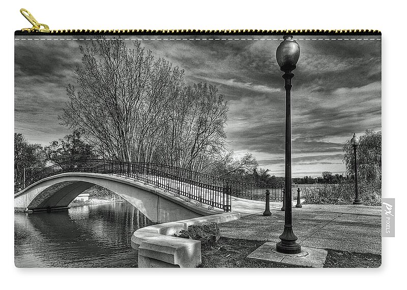 Bridge Zip Pouch featuring the photograph Winter's Bridge #1 by Rodney Campbell