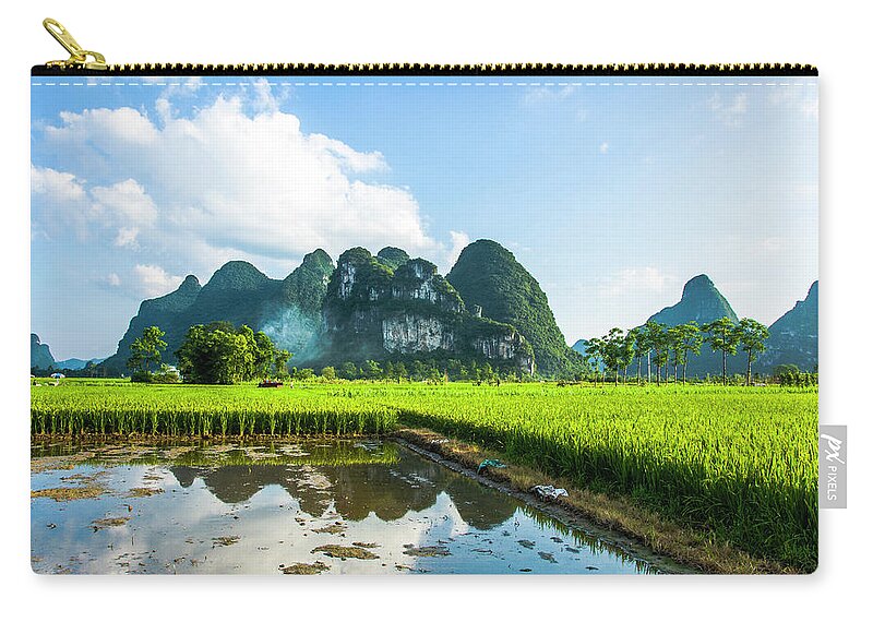 Landscape Zip Pouch featuring the photograph The beautiful karst rural scenery #147 by Carl Ning