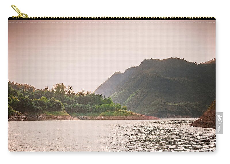 Red Zip Pouch featuring the photograph The mountains and lake scenery in sunset #17 by Carl Ning