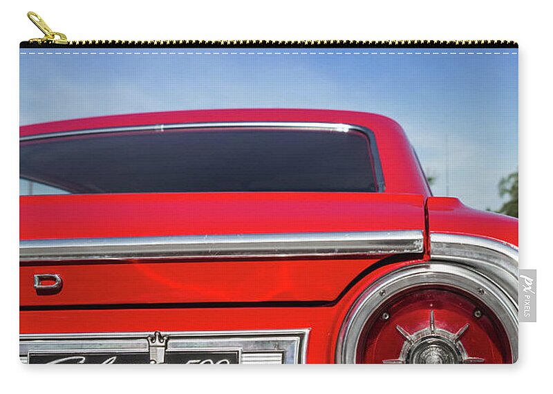 1964 Carry-all Pouch featuring the photograph 1964 Ford Galaxie 500 Taillight and Emblem by Ron Pate
