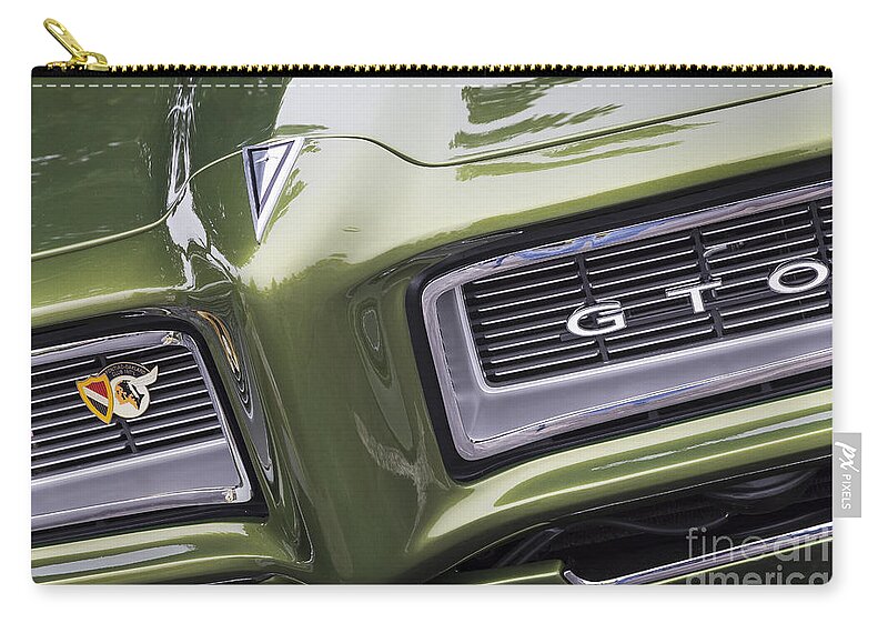 Pontiac Zip Pouch featuring the photograph 1968 GTO Grille by Dennis Hedberg