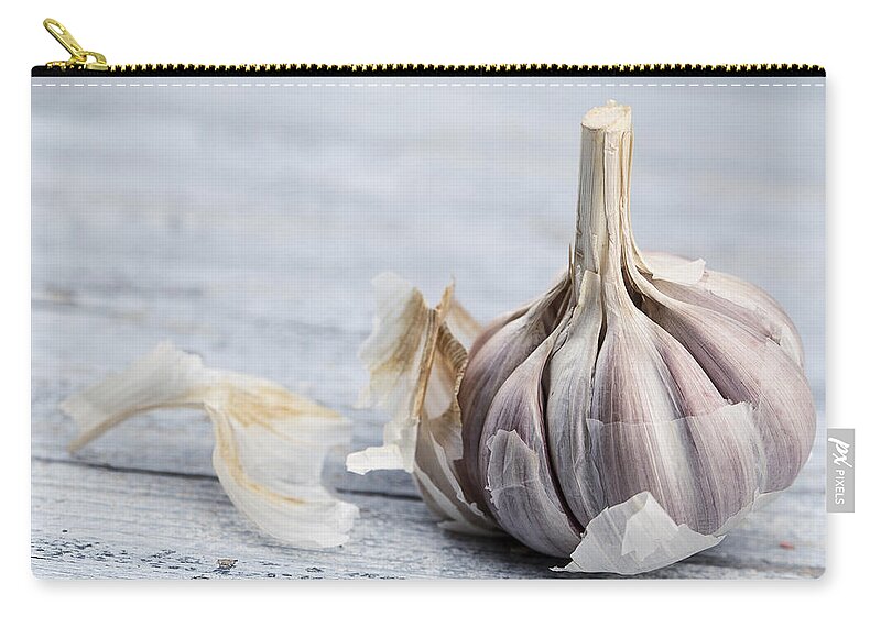 Garlic Zip Pouch featuring the photograph Garlic #2 by Nailia Schwarz
