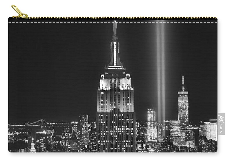 New York City Skyline At Night Zip Pouch featuring the photograph New York City Tribute in Lights Empire State Building Manhattan at Night NYC by Jon Holiday
