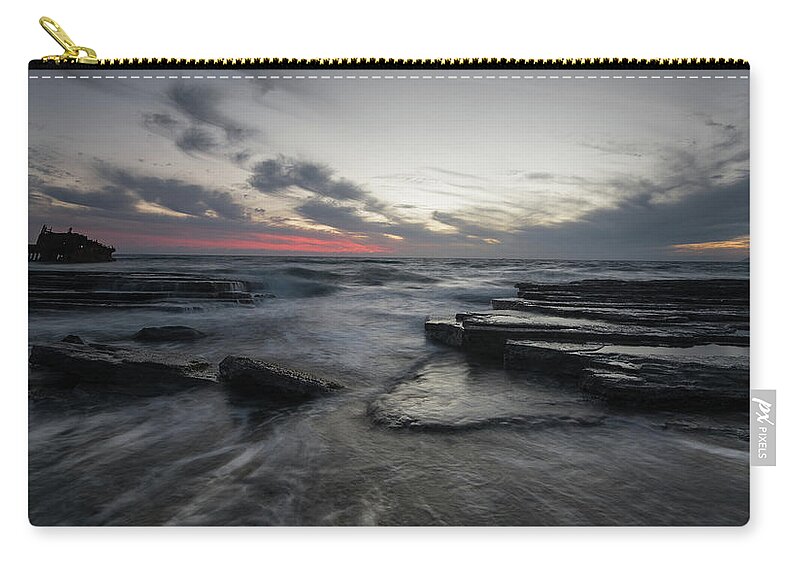 Seascape Carry-all Pouch featuring the photograph Shipwreck of an abandoned ship on a rocky shore by Michalakis Ppalis