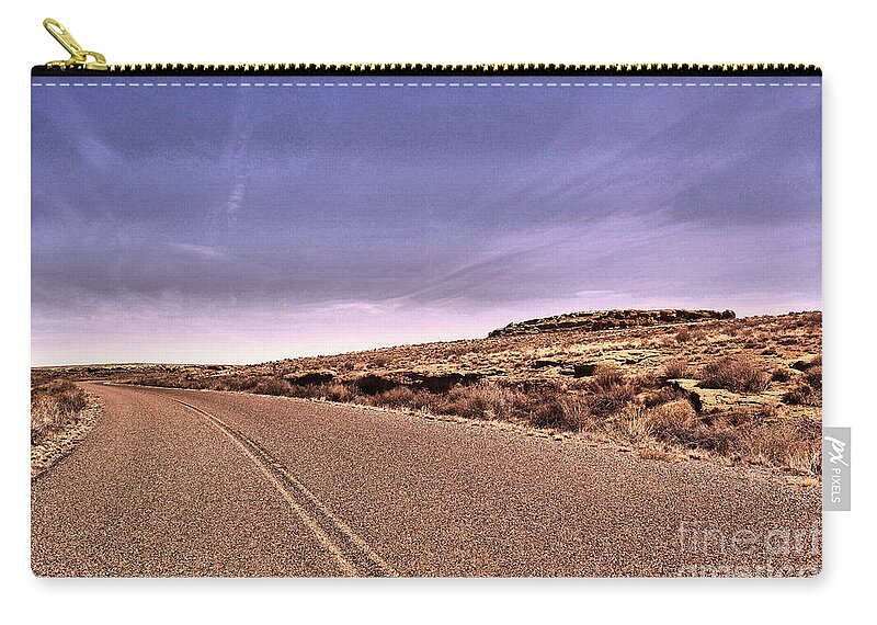 Road Zip Pouch featuring the photograph That long long road #2 by Jeff Swan