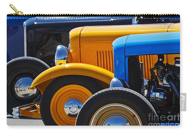 Transportation Carry-all Pouch featuring the photograph '32 X 3 by Dennis Hedberg