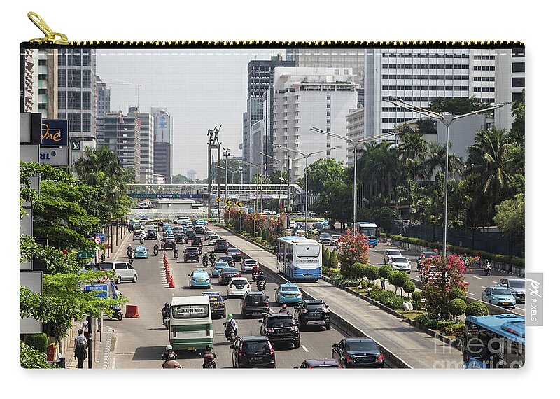 Capital Cities Zip Pouch featuring the photograph Traffic along Sudirman avenue in Jakarta, Indonesia capital city #4 by Didier Marti