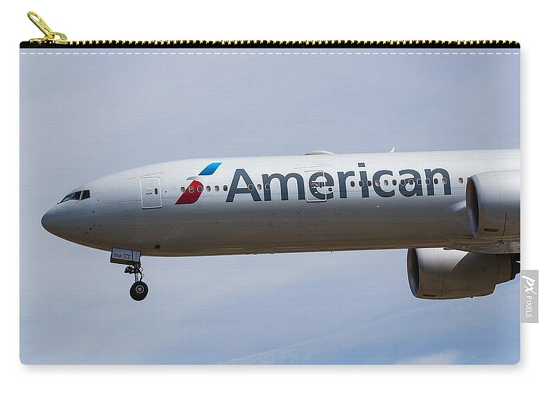 American Zip Pouch featuring the photograph American Airlines Boeing 777 #6 by David Pyatt