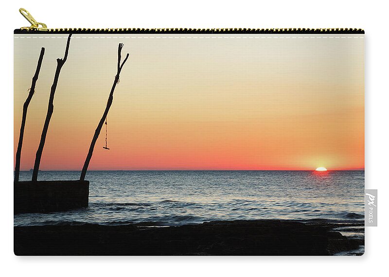 Ba�anija Zip Pouch featuring the photograph Sunset at basanija by Ian Middleton