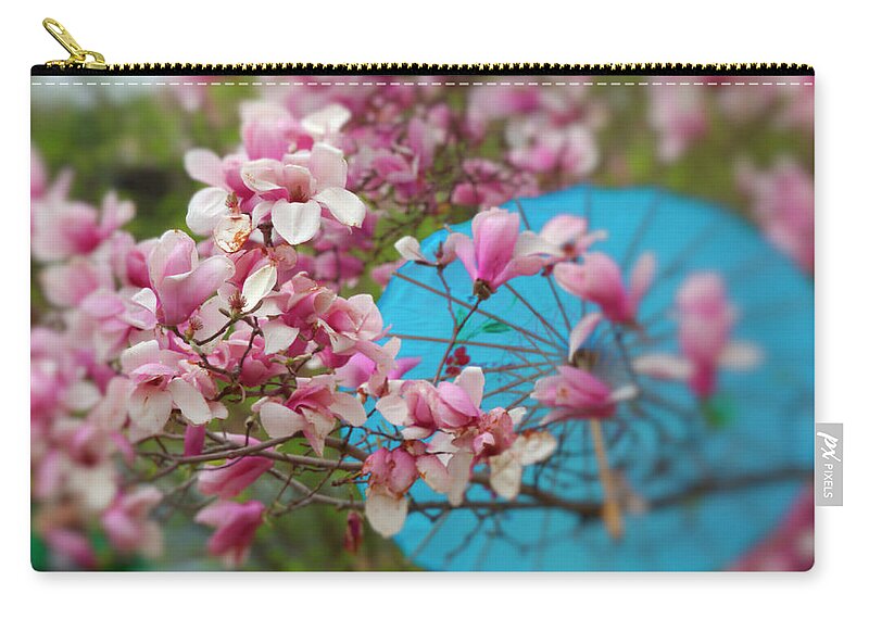 Cherry Blossom Festival Zip Pouch featuring the photograph A blue umbrella by Agnes Caruso