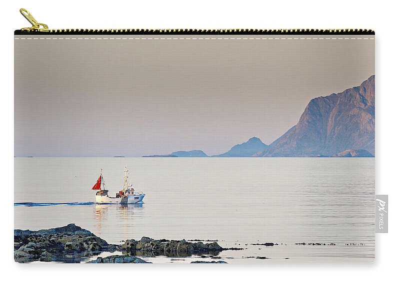 Landscape Zip Pouch featuring the photograph A fishing boat comes in from the sea by Ulrich Kunst And Bettina Scheidulin
