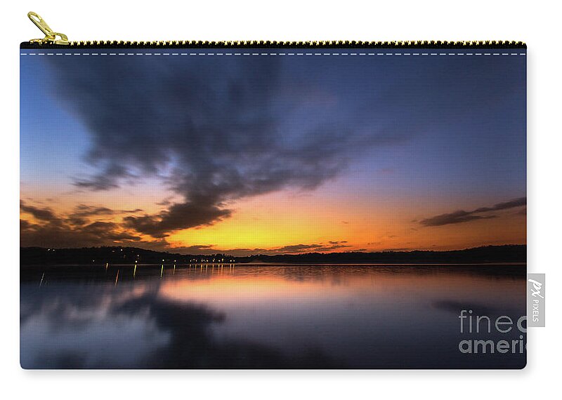 Lake-lanier Zip Pouch featuring the photograph A misty sunset on Lake Lanier by Bernd Laeschke