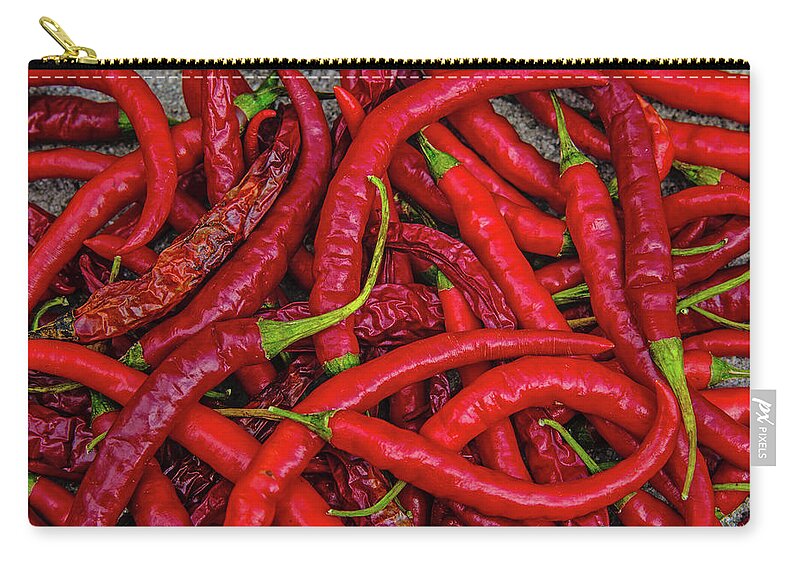 A Peck Of Unpickled Peppers Prints Zip Pouch featuring the photograph A Peck of Unpickled Peppers by John Harding