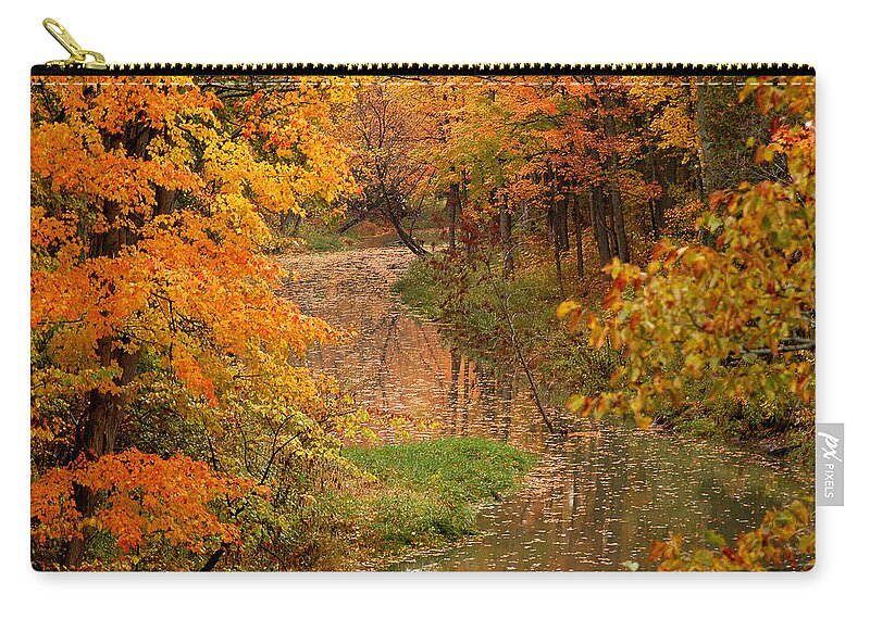 Autumn Zip Pouch featuring the photograph A Quiet River in Fall by Linda McRae