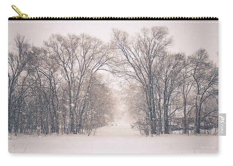  Zip Pouch featuring the photograph A Snowy Monday by Viviana Nadowski