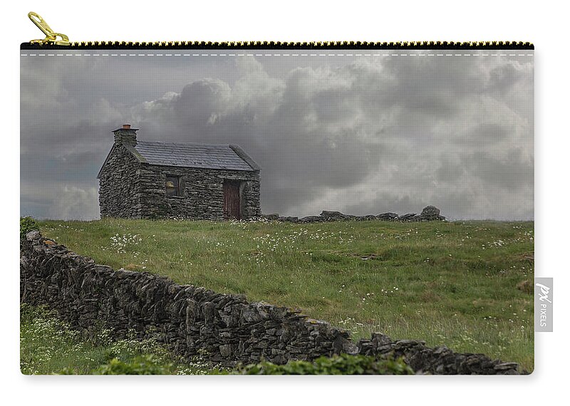 Innis Oirr Zip Pouch featuring the photograph A Stone House on the Hill by Teresa Wilson