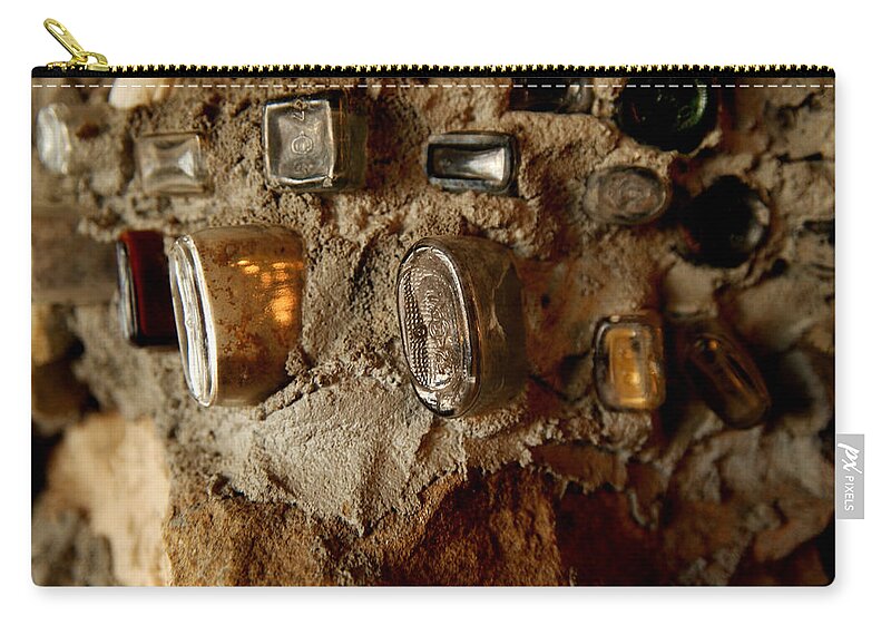 Art Zip Pouch featuring the photograph A wall of bottles by Jeff Swan