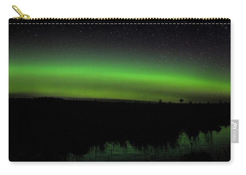 Aurora Borealis Zip Pouch featuring the photograph Ackley Green Glow by Dale Kauzlaric