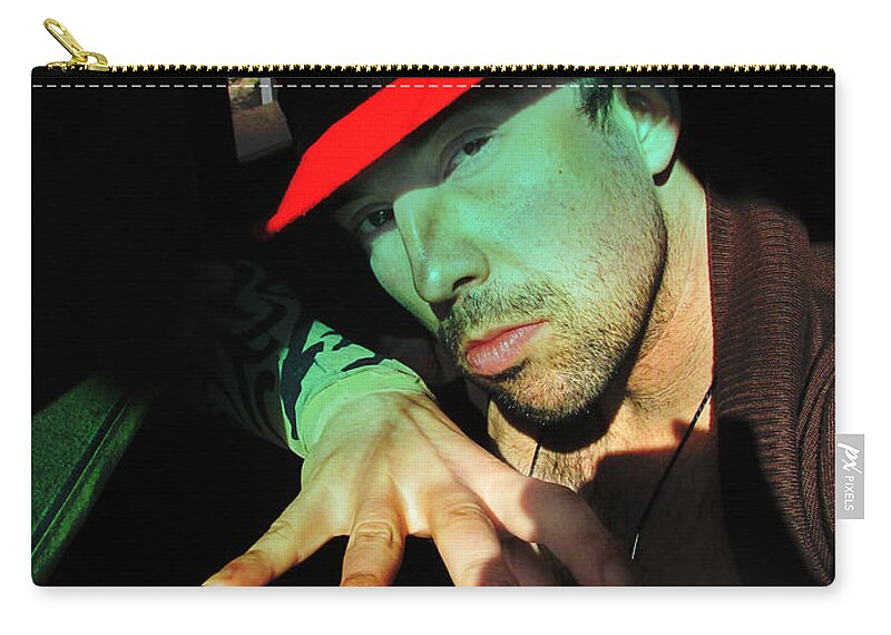  Zip Pouch featuring the photograph Alien Hat by John Gholson