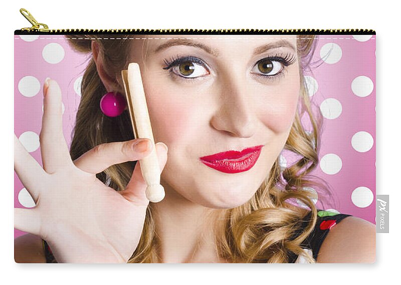 Bathroom Zip Pouch featuring the photograph Amercian pinup girl with laundry peg by Jorgo Photography