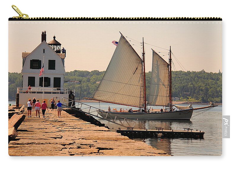 Seascape Zip Pouch featuring the photograph American Eagle At The Lighthouse by Doug Mills