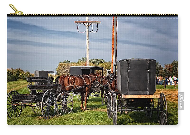 Amish Zip Pouch featuring the photograph Amish at the auction by Al Mueller