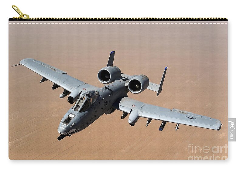 A-10 Zip Pouch featuring the photograph An A-10 Thunderbolt II Over The Skies by Stocktrek Images