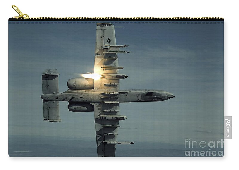 A-10 Zip Pouch featuring the photograph An A-10 Warthog Breaks Over The Pacific by Stocktrek Images