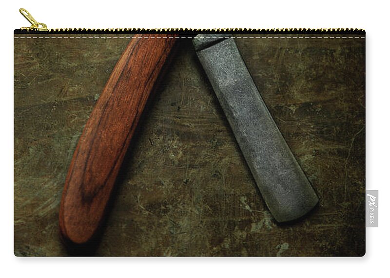 Shave Zip Pouch featuring the photograph An old rusty razor by Jaroslaw Blaminsky