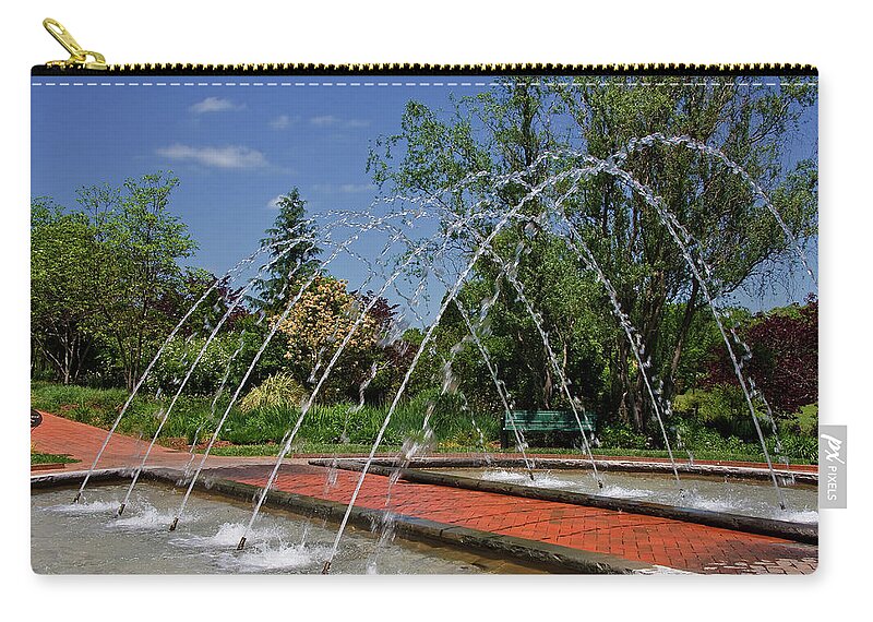 Water Fountains Zip Pouch featuring the photograph Arch Fountain at Daniel Stowe by Jill Lang