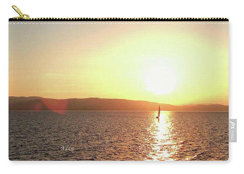 Sailboat On Water Zip Pouch featuring the photograph Solitary Sailboat by Felipe Adan Lerma