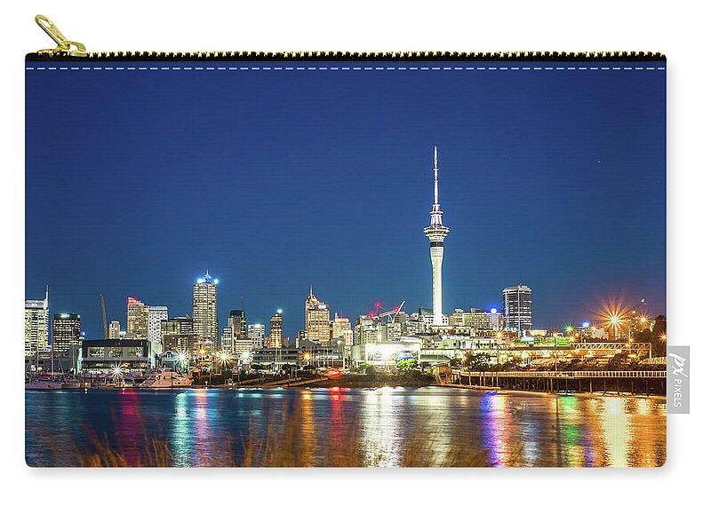 Auckland Zip Pouch featuring the photograph Auckland at dusk by Jose Maciel