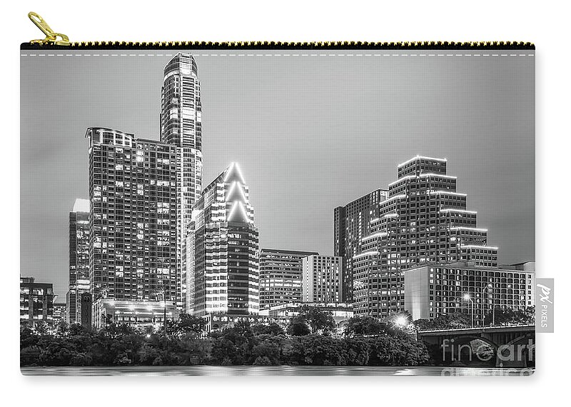 100 Congress Building Zip Pouch featuring the photograph Austin Texas Skyine at Night Black and White Photo by Paul Velgos