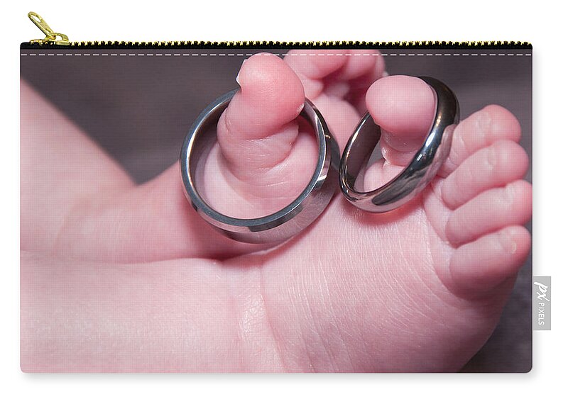 Baby Zip Pouch featuring the photograph Baby Feet With Wedding Rings by Susan Cliett