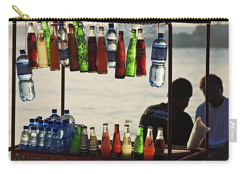 Zanzibar Zip Pouch featuring the photograph Backlit bottles by David Taylor